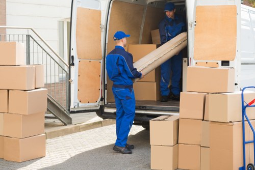 Man with van in Queensbury loading furniture into a van
