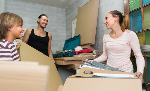 Professional movers in Queensbury preparing a home for moving day