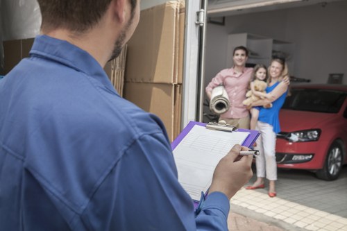 Worker using proper lifting technique during a move