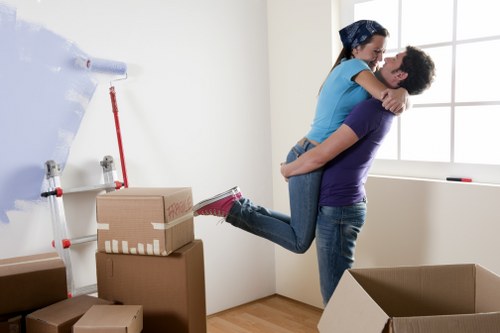 Removal crew loading furniture carefully for a home or office move in Queensbury
