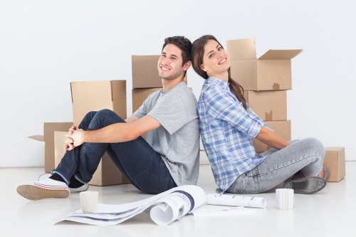 House removalists in Queensbury packing fragile household items with care