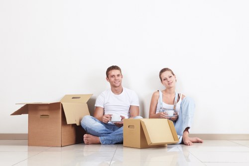 Careful loading of household furniture for transport in Queensbury