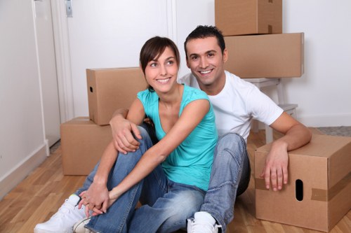 Professional Queensbury man and van team with moving equipment