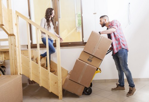 Careful packing and furniture protection for Queensbury flat moves