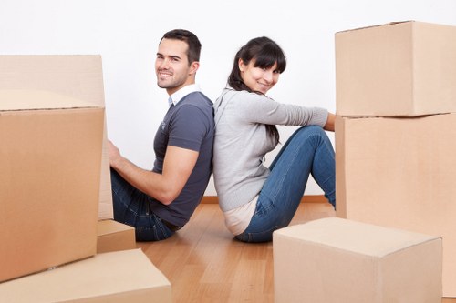 Removal team planning a same day move with boxes and furniture in Queensbury