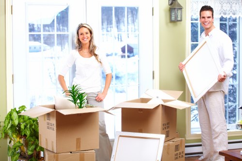 Local removals team navigating a Queensbury street for a house move