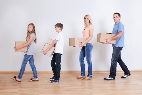 Professional furniture removal team handling bulky items in Queensbury
